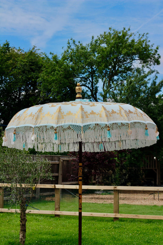 Mother Of Pearl Blue handmade Balinese-style garden parasol with gold hand painted detail and white tassel fringe