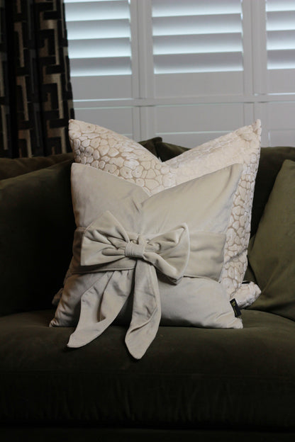 Cream Bow Velvet Cushion styled view – Leya Buster Interiors