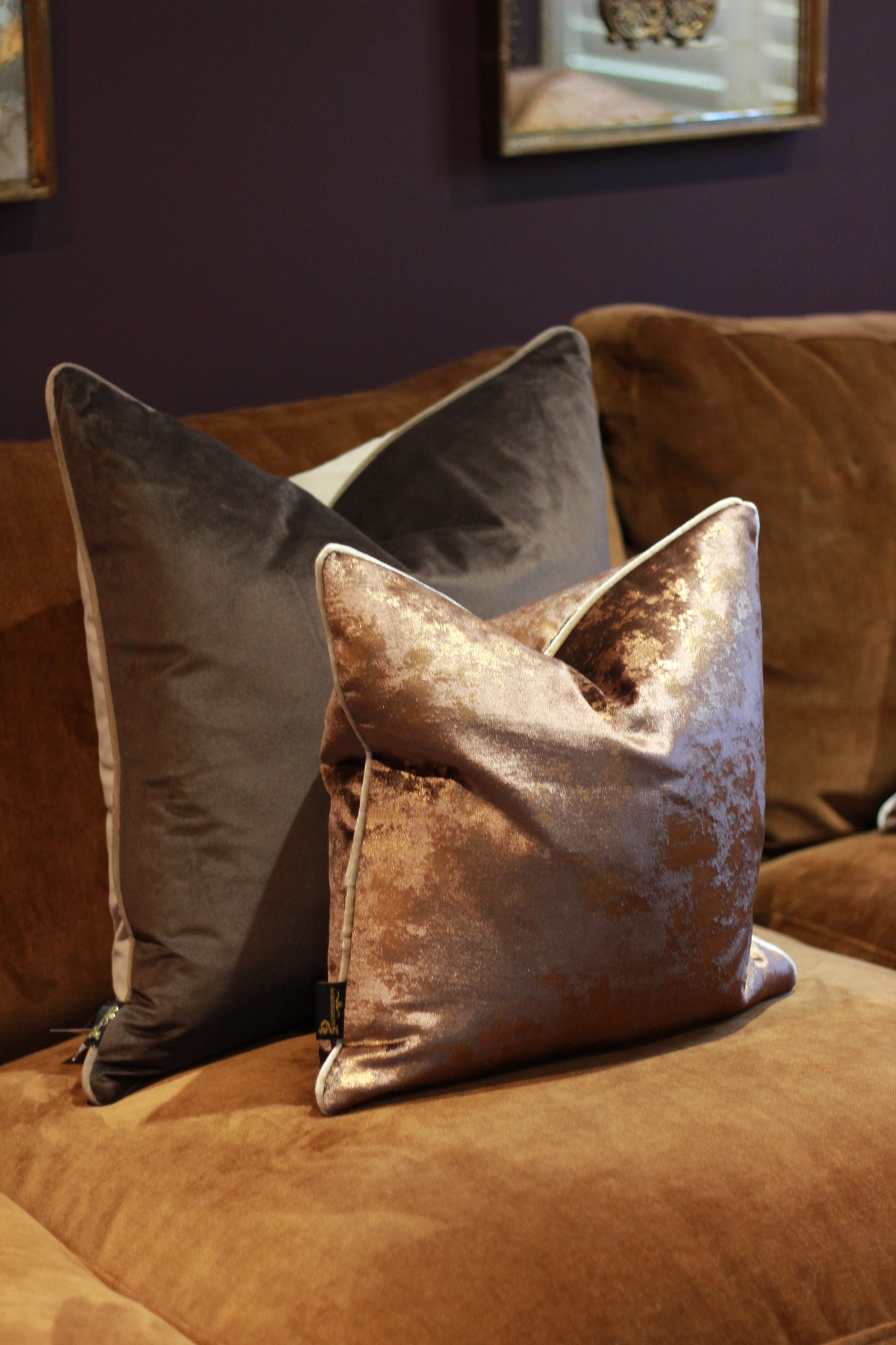 Close-up detail of brown and taupe velvet cushion