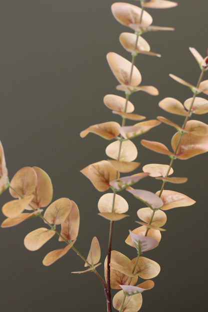 Burnished Orange Eucalyptus Stem detail view of warm faux foliage