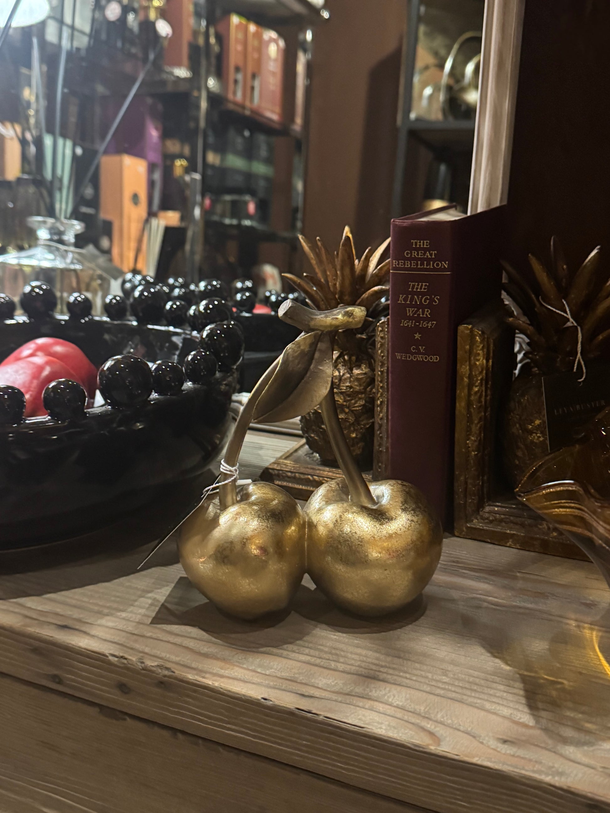 Decorative gold cherries ornament shown from an alternative angle.