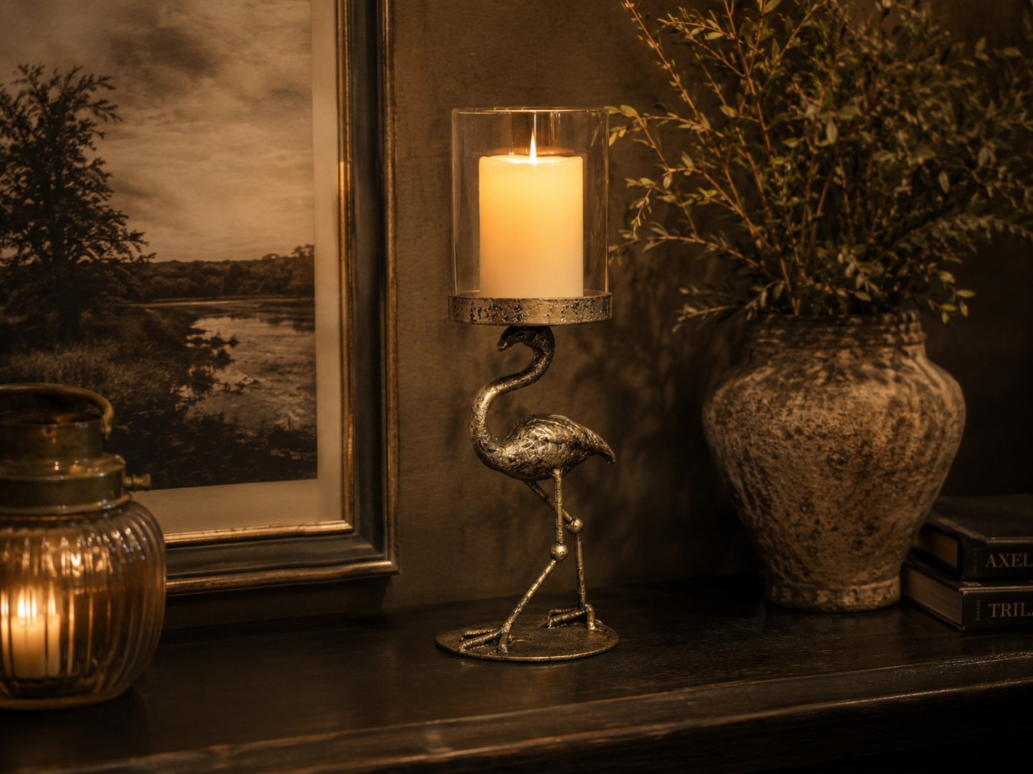 Flamingo-shaped metal candle holder shown from an alternative angle.