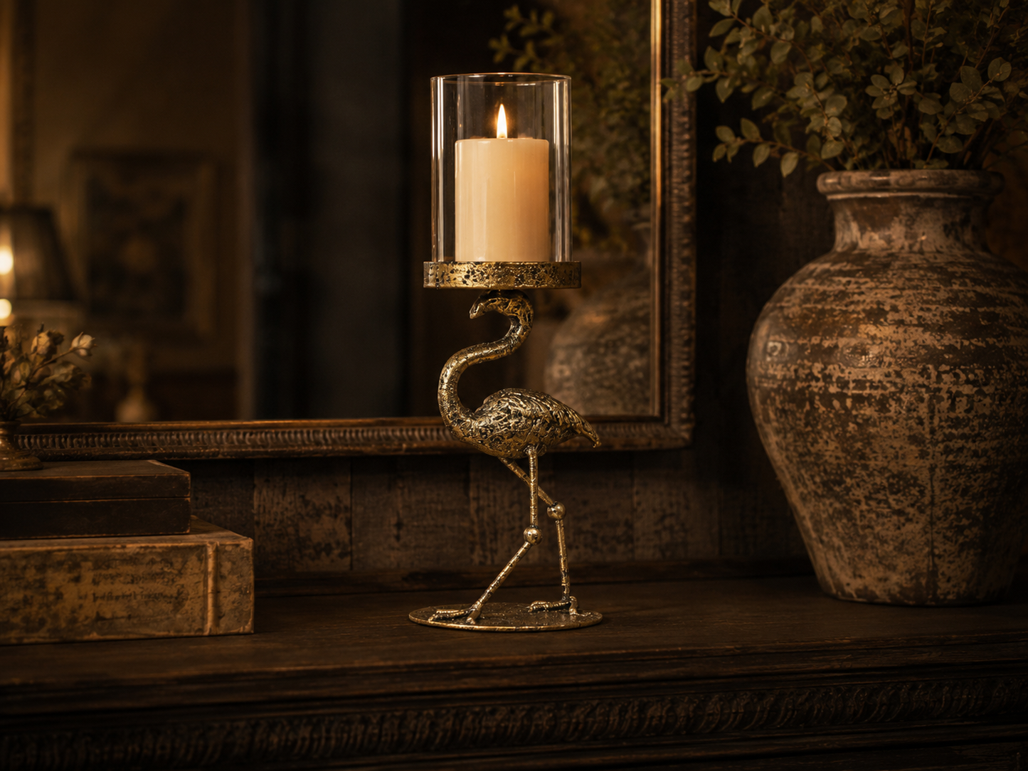 Detailed view of the sculpted flamingo candle holder and glass insert.