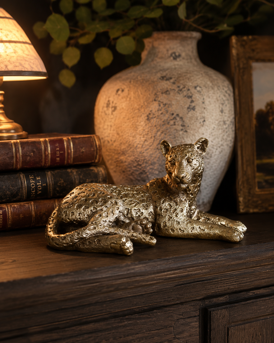 Gold leopard ornament adding maximalist character to a styled room.