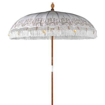 Gold and white handmade Balinese-style garden parasol with floral painted detail and fringed tassel edge