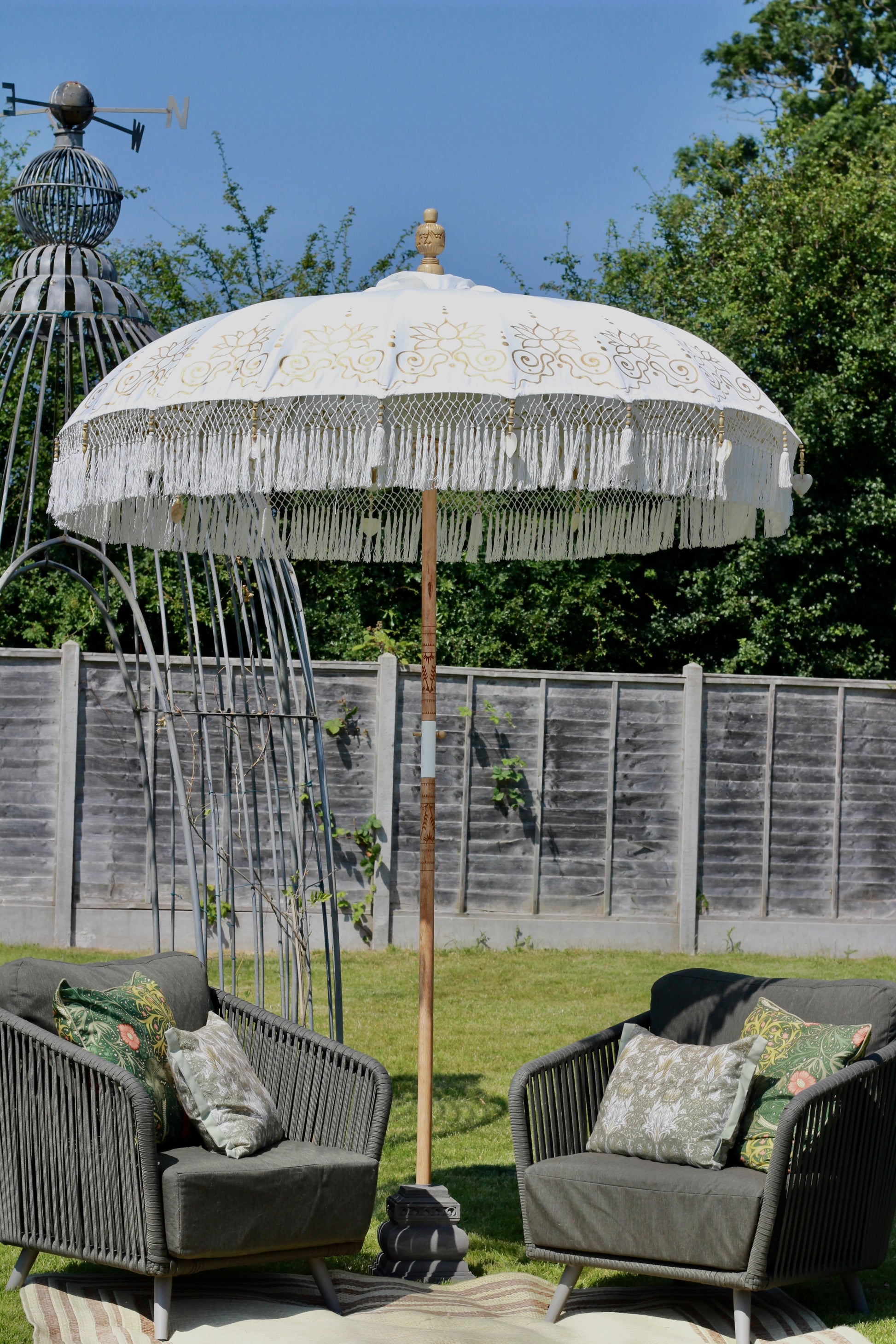 Gold and white garden parasol for summer outdoor living and elegant garden decor