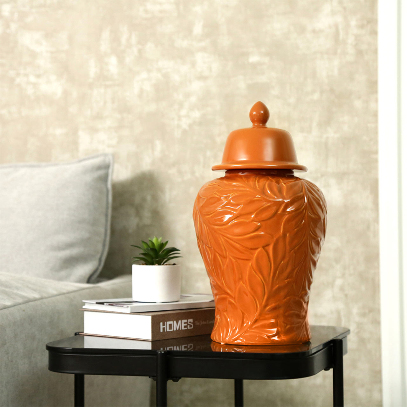 Orange ginger jar, ceramic decorative jar, embossed leaf jar, bold home décor, orange vase with lid, colourful interior accessories, statement ceramic jar